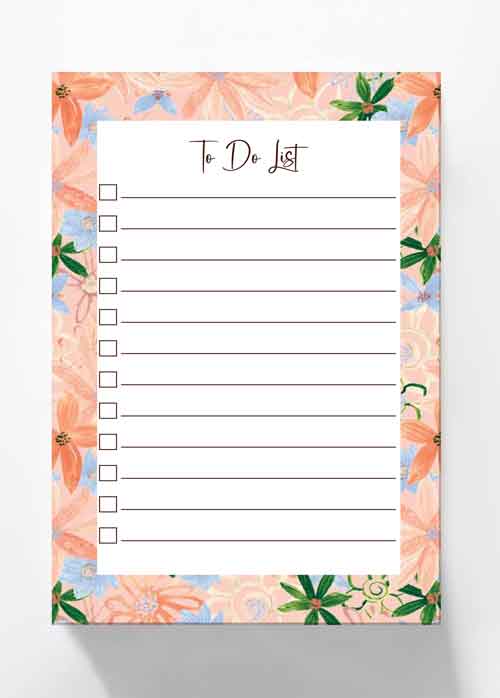 A floral to-do list notepad with a peach, pink, and green watercolor flower border and a white writing area that reads 'To Do List' at the top.