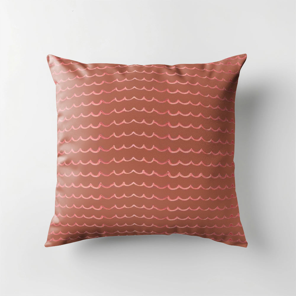 Decorative pillow with wavy pattern on a plain background