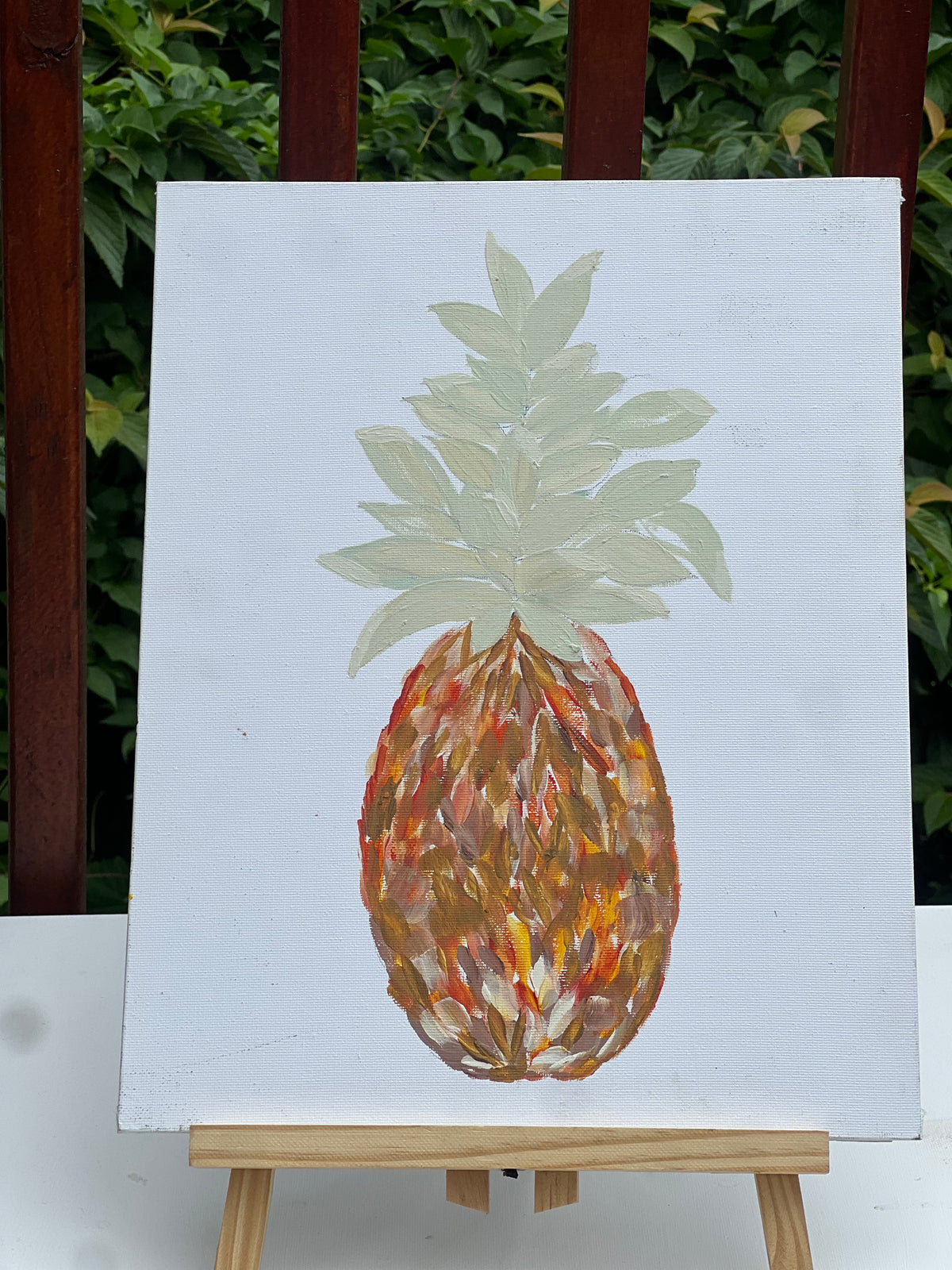 Pineapple:Original pineapple painting from the Gathered in Abundance collection, featuring warm orange, gold and soft green tones on a light background